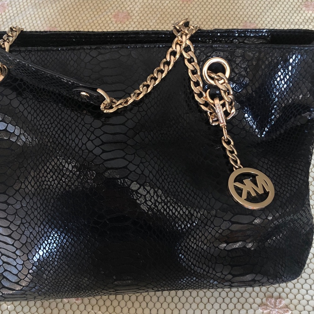 Luxurious Black Embossed Shoulder Bag with Gold Chain
